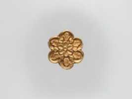Free download Flower-Shaped Clothing Plaque free photo or picture to be edited with GIMP online image editor