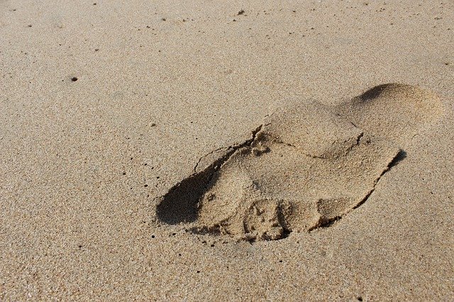 Descarga gratuita Footprint Sand Ocean Zulu - foto o imagen gratuita para editar con el editor de imágenes en línea GIMP