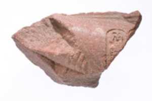 Free download Forearm from a bent royal arm crossing the front profile of figures body and the rear profile of a second figure, arm marked with Aten cartouches, supported by the hand of an Aten ray free photo or picture to be edited with GIMP online image editor