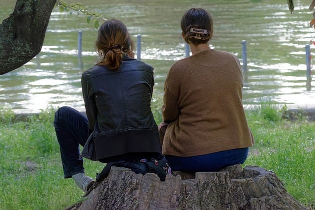 Free download girls together sitting tree trunk free picture to be edited with GIMP free online image editor