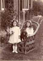 Free download Girls, Two With Their Dog Sitting On Canework Chair ( 1900 Rubel Coll.) free photo or picture to be edited with GIMP online image editor