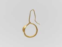 Free download Gold earring with convex disk free photo or picture to be edited with GIMP online image editor