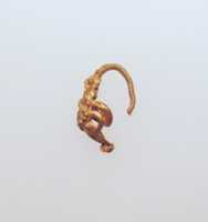 Free picture Gold earring with winged figure to be edited by GIMP online free image editor by OffiDocs