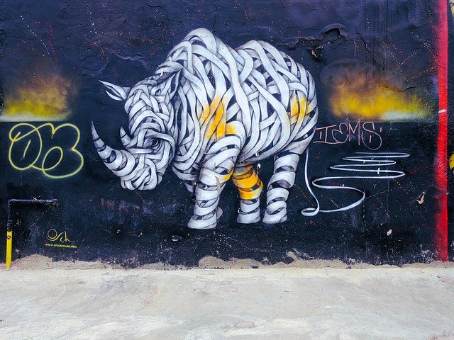 Descarga gratuita Graffiti Rhino Background: foto o imagen gratuita para editar con el editor de imágenes en línea GIMP