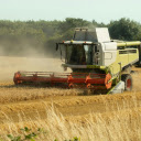 Green and Red Tractor on Farm Field  screen for extension Chrome web store in OffiDocs Chromium