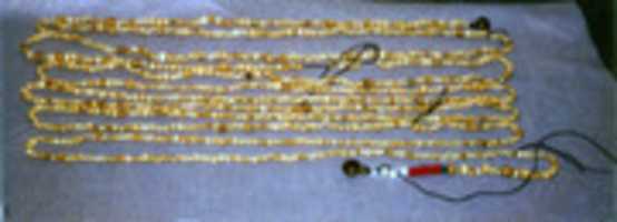 Free download Group of Beads from an Apron and Two Bells free photo or picture to be edited with GIMP online image editor
