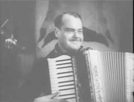Free download Harley Luse (as the accordion player) | Trouble in Texas (1937) free photo or picture to be edited with GIMP online image editor