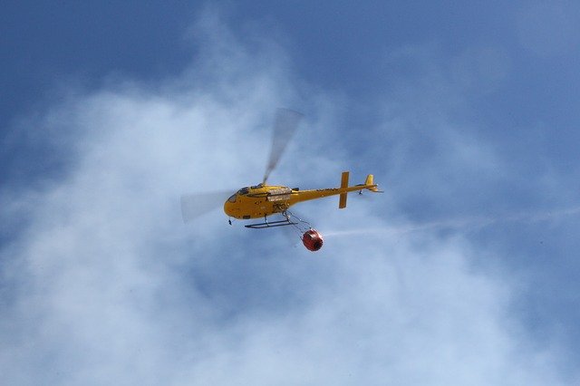 Muat turun percuma Helicopter Fire - foto atau gambar percuma untuk diedit dengan editor imej dalam talian GIMP