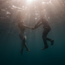 Holding hands under the lake  screen for extension Chrome web store in OffiDocs Chromium