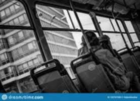 Free download homeless-man-riding-old-tram-socialist-country-rides-looks-architecture-out-scratched-window-192767000 free photo or picture to be edited with GIMP online image editor