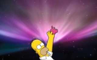Free download Homer Grabbing Apple Logo free photo or picture to be edited with GIMP online image editor