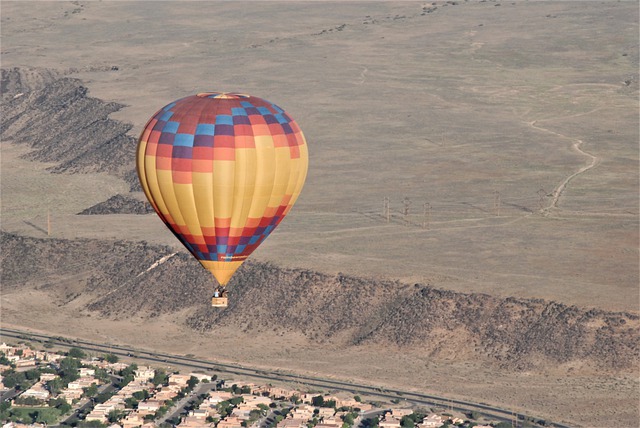 Free download hot air balloon over city high up free picture to be edited with GIMP free online image editor