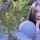 IU in a lilac dress  screen for extension Chrome web store in OffiDocs Chromium