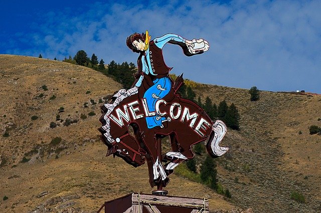 Muat turun percuma Jackson Cowboy Sign Welcome - foto atau gambar percuma untuk diedit dengan editor imej dalam talian GIMP