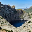 lake nestled between majestic mountain peaks.  screen for extension Chrome web store in OffiDocs Chromium