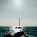 Landscape Photography of a Sailboat at Sea  screen for extension Chrome web store in OffiDocs Chromium