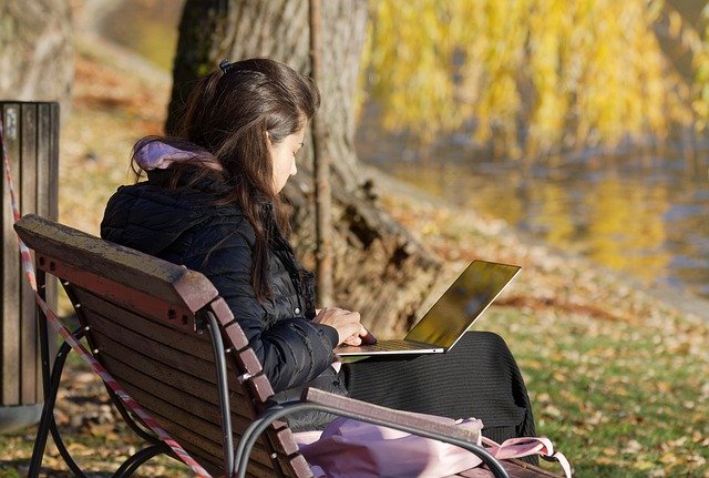 Free download laptop bench woman leisure free picture to be edited with GIMP free online image editor