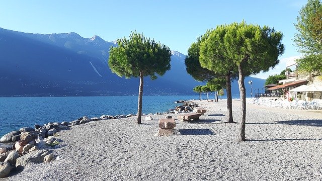 Free download Lemon On Garda Beach Cola Lake -  free photo or picture to be edited with GIMP online image editor