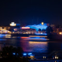 Lighted Building Near Body of Water during Night Time  screen for extension Chrome web store in OffiDocs Chromium