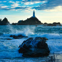 Lighthouse and waves  screen for extension Chrome web store in OffiDocs Chromium