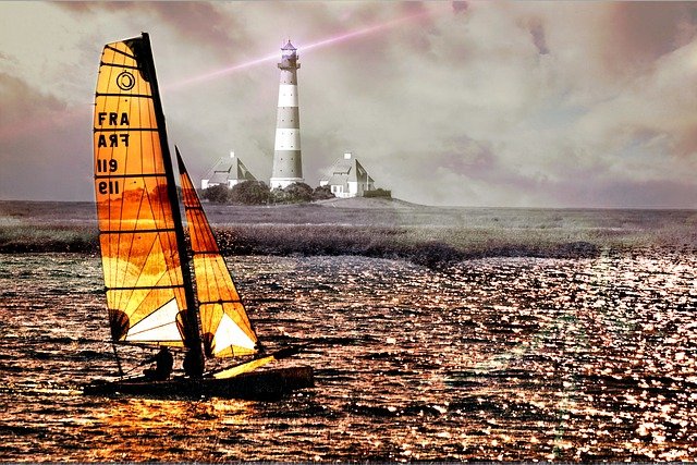 Free graphic lighthouse boat sea night sailing to be edited by GIMP free image editor by OffiDocs