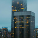 Lights in Windows of Glass Skyscrapers in City  screen for extension Chrome web store in OffiDocs Chromium