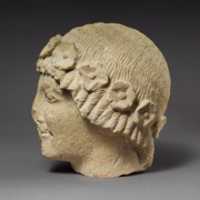 Free download Limestone beardless male head with a wreath of rosettes free photo or picture to be edited with GIMP online image editor