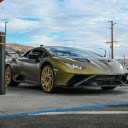 Luxury Olive Green Sports Car at a Gas Station  screen for extension Chrome web store in OffiDocs Chromium