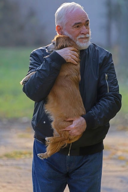 Free download man elderly holding dog love free picture to be edited with GIMP free online image editor