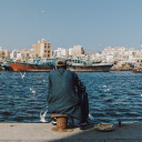 Man fishing on the pier  screen for extension Chrome web store in OffiDocs Chromium