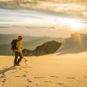 Man Hiking in Mountains at Sunset  screen for extension Chrome web store in OffiDocs Chromium
