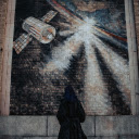 Man in Black Coat Standing on Brown Brick Wall  screen for extension Chrome web store in OffiDocs Chromium