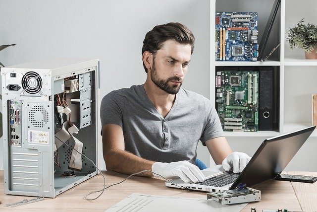 Free download man technician apple repair free picture to be edited with GIMP free online image editor