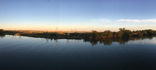 Безкоштовно завантажте Marsh Sunset Landscape — безкоштовну фотографію чи зображення для редагування за допомогою онлайн-редактора зображень GIMP