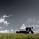 Men sleeping on the grass  screen for extension Chrome web store in OffiDocs Chromium
