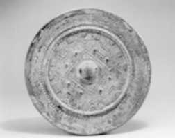 Free download Mirror Based on Han-Dynasty Prototype with Cosmological Design free photo or picture to be edited with GIMP online image editor