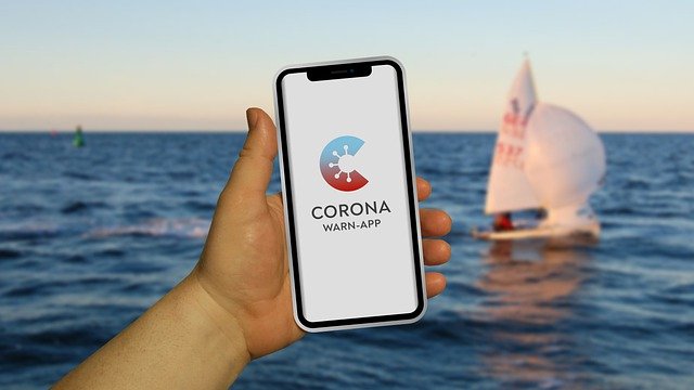 Free graphic mobile corona warning app hand sea to be edited by GIMP free image editor by OffiDocs