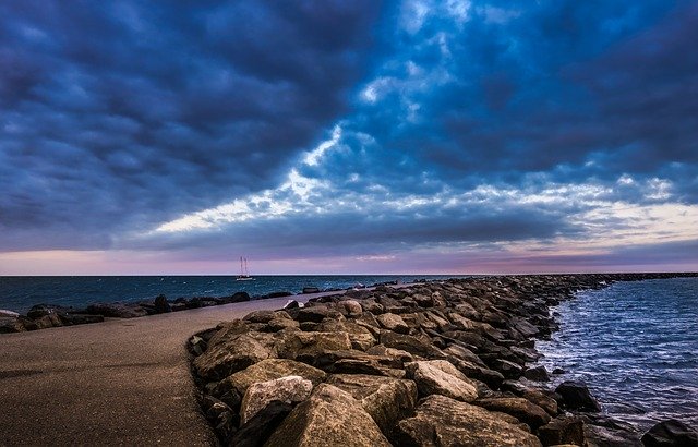 Безкоштовно завантажте Mole Sea Sunset - безкоштовну фотографію або зображення для редагування за допомогою онлайн-редактора зображень GIMP