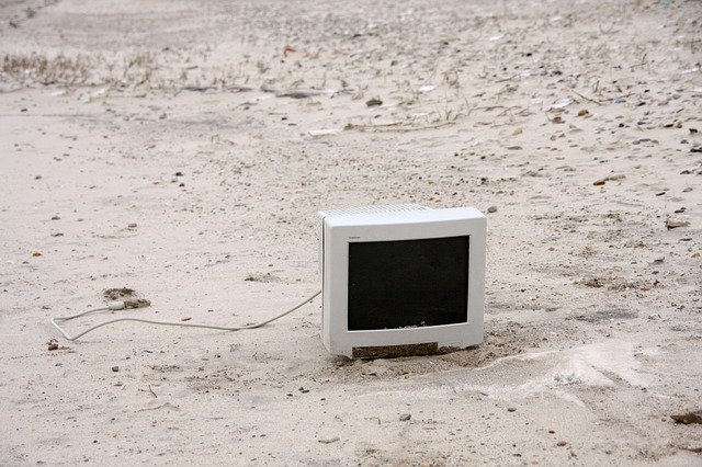 Free download Monitor On The Beach Washed Up -  free photo or picture to be edited with GIMP online image editor