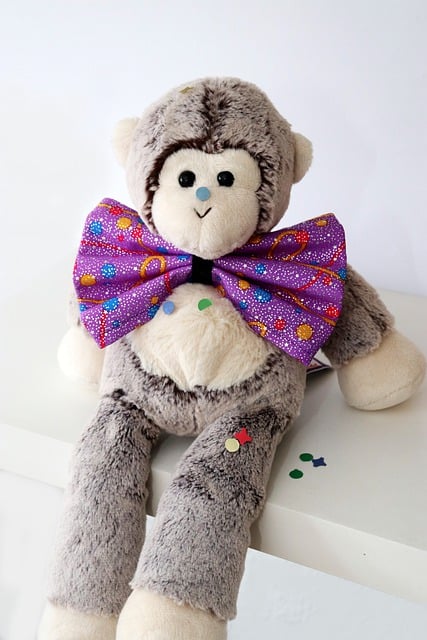 Free download monkey stuffed animal fly confetti free picture to be edited with GIMP free online image editor