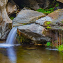 Mossy rock and waterfall  screen for extension Chrome web store in OffiDocs Chromium