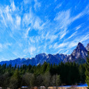Mountains and Blue Clouds  screen for extension Chrome web store in OffiDocs Chromium