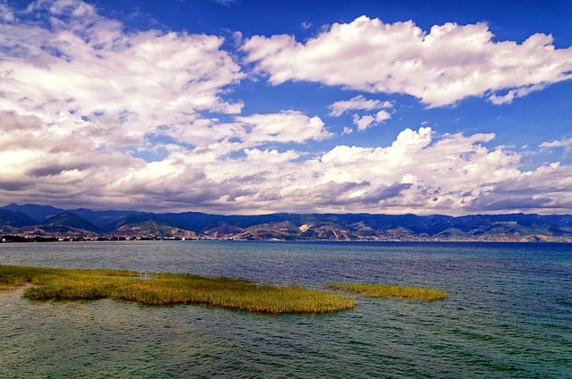 Free download mountains clouds sea ocean bright free picture to be edited with GIMP free online image editor