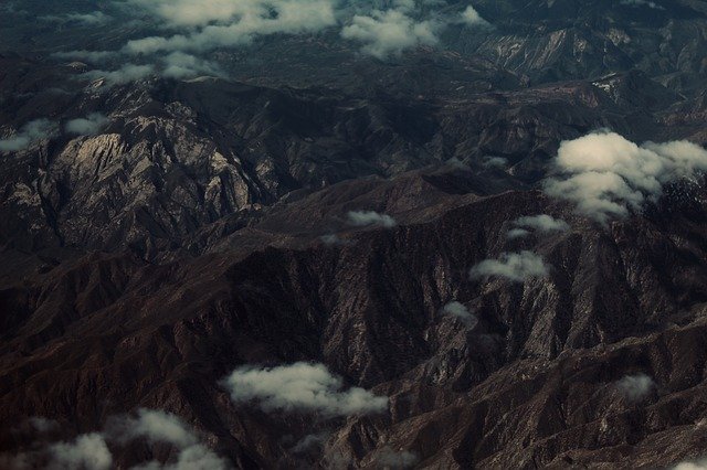 Muat turun percuma Mountains Dark Cloudy - foto atau gambar percuma untuk diedit dengan editor imej dalam talian GIMP