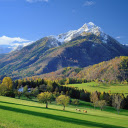 Mountains with green grass  screen for extension Chrome web store in OffiDocs Chromium