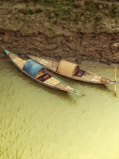 Unduh gratis Nature River Boat - foto atau gambar gratis untuk diedit dengan editor gambar online GIMP