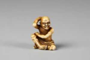 Free download Netsuke of Figure of a Man Scratching His Back free photo or picture to be edited with GIMP online image editor