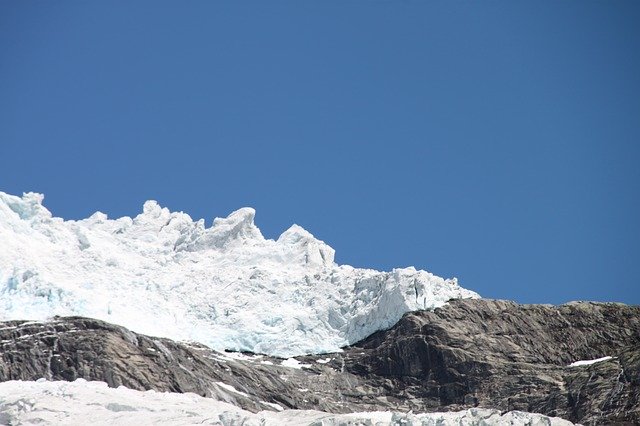 Descarga gratuita Montañas glaciares de Noruega: foto o imagen gratuitas para editar con el editor de imágenes en línea GIMP