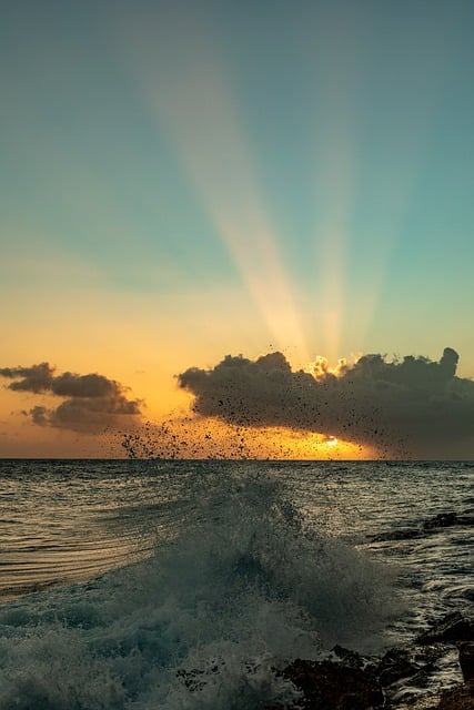 הורדה חינם אוקיינוס ​​שקיעה קרני שמש קוראסאו תמונה בחינם לעריכה עם עורך תמונות מקוון בחינם של GIMP