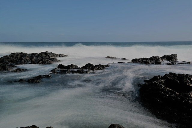 Download gratuito Ocean Wave Stones - foto o immagine gratuita da modificare con l'editor di immagini online di GIMP